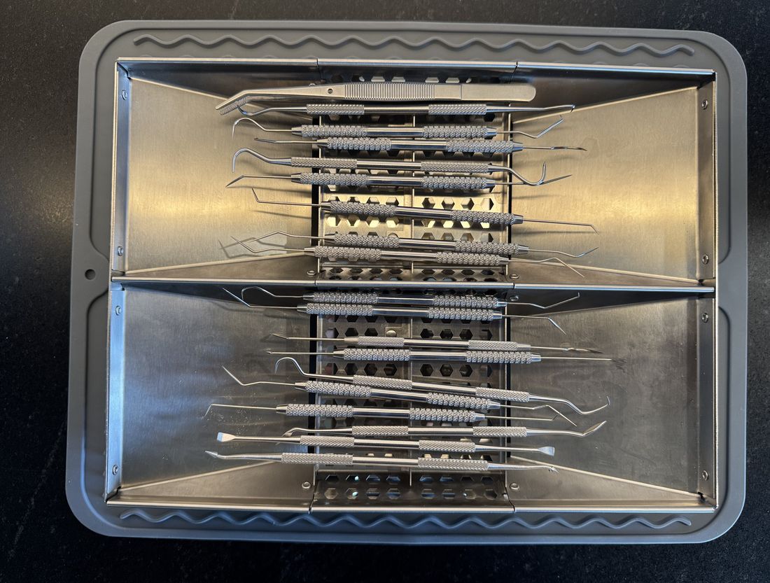 DriRak Instrument rack from above with instruments aligned across two trays
